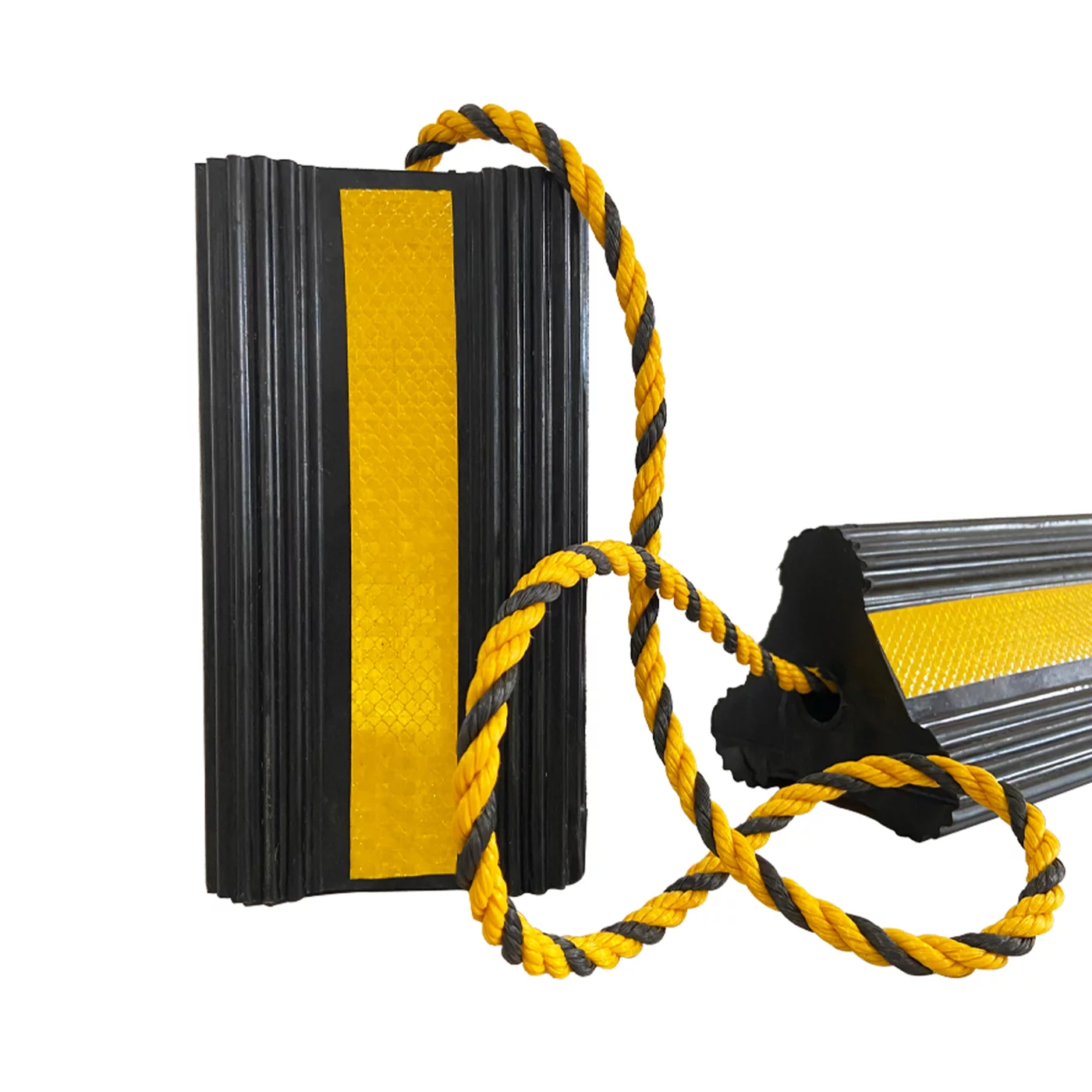 Černo-žlutý gumový zakládací klín pod kola FLOMA AWCF46 - 30 x 14 x 12,5 cm